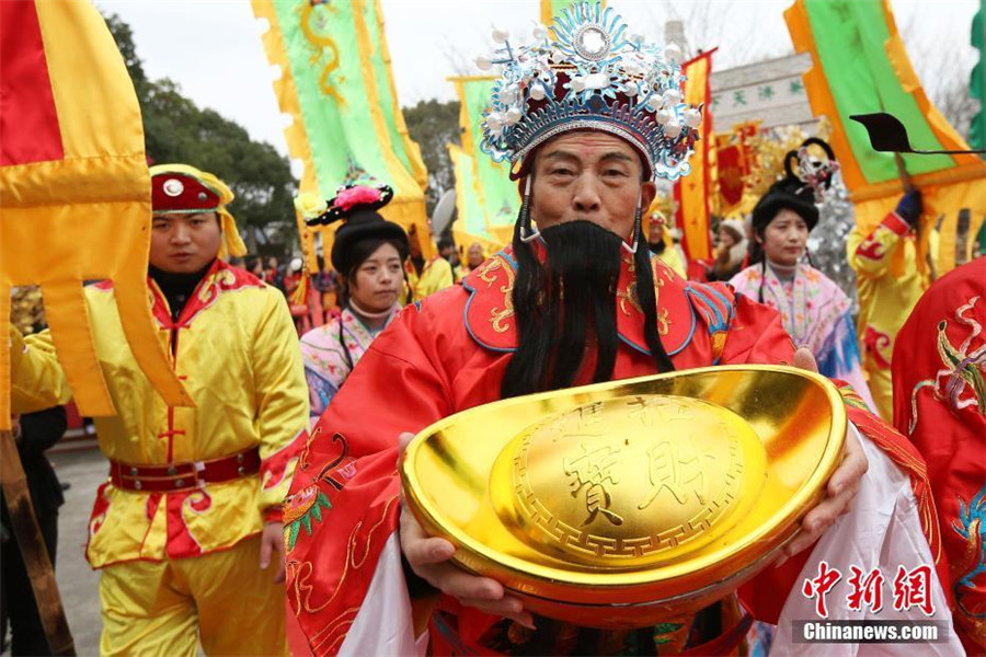 Water village welcomes 'God of Wealth' with ancient ceremony