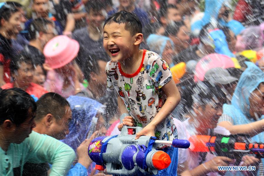 Water-sprinkling festival marked in SW China