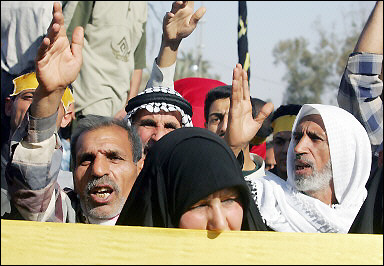 Shiite Muslim demonstrators converge on the Jordanian embassy in Baghdad. Iraq is recalling its ambassador to Jordan in a tit-for-tat move against its western neighbour after Amman withdrew its envoy to protest anti-Jordanian protests. [AFP/File]