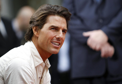 Actors Nicolas Cage and Tom Cruise attend hand and footprints ceremony for producer Jerry Bruckheimer