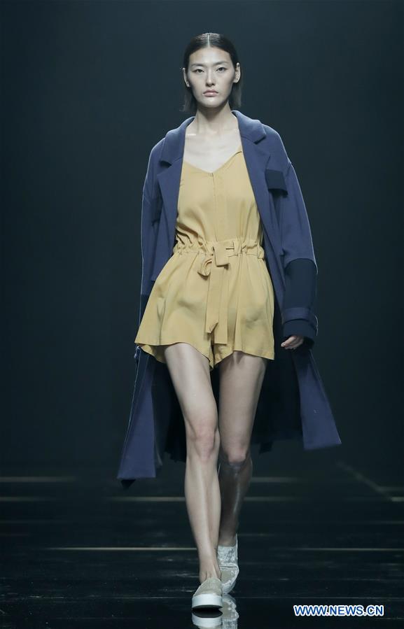 Joint fashion creations presented at China Fashion Week