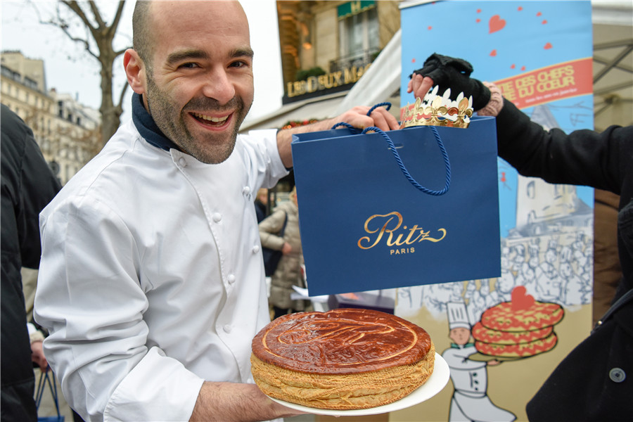 Pastry cooks participate in charity bazaar in Paris