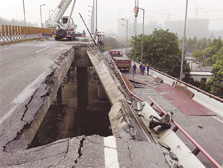 Truck driver hurt in bridge collapse