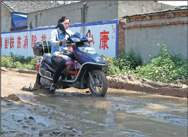 Roads improving, giving villagers path out of poverty