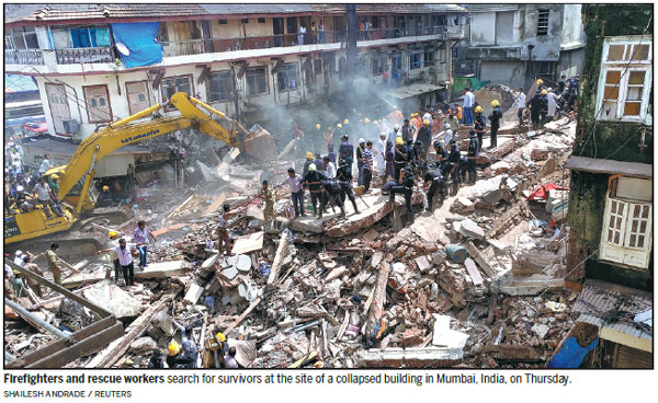 Building collapse kills 18 after days of rain in India