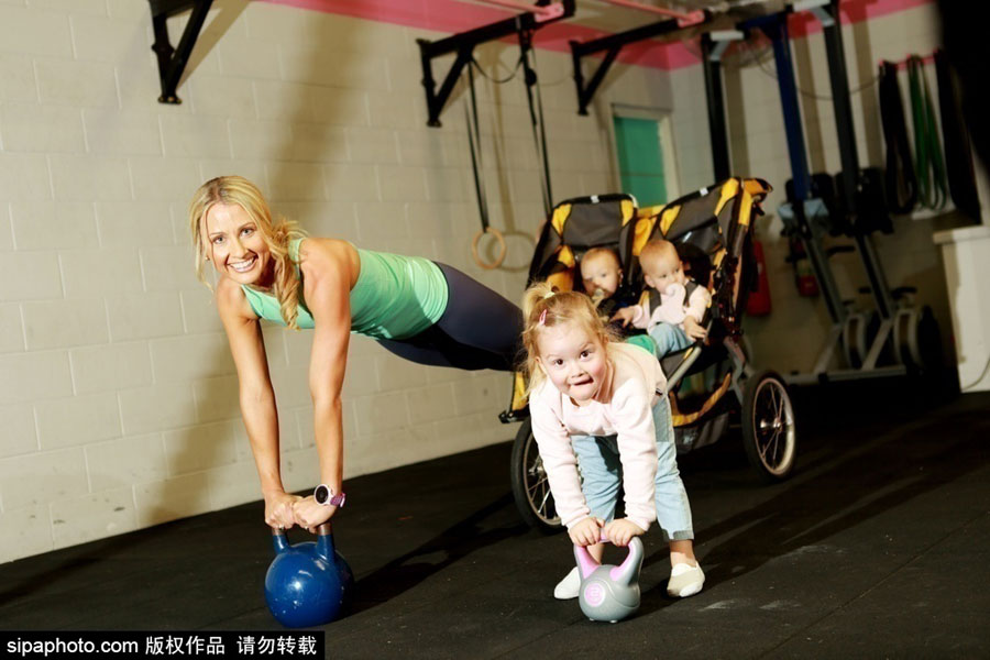 Super fit mother works out with her three children