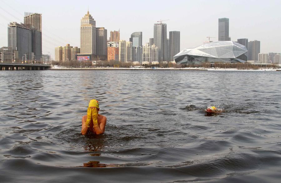 Woman's winter swimming photo listed in Reuters 2015 best aerial photos