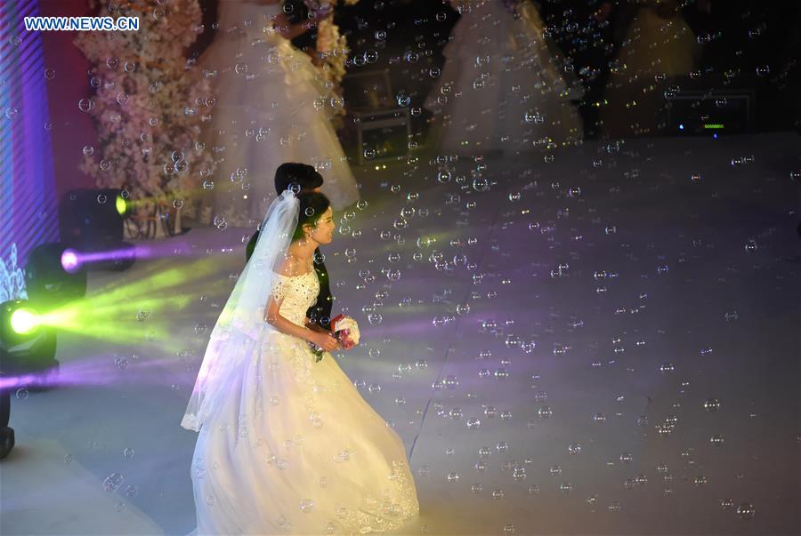 114 couples attend group wedding in China's Nanjing