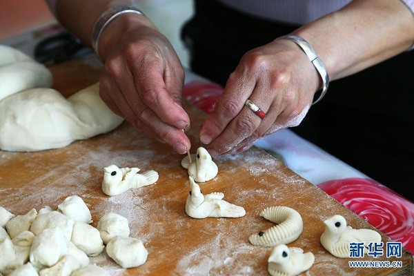 Animal-shaped buns made for Qingming Festival