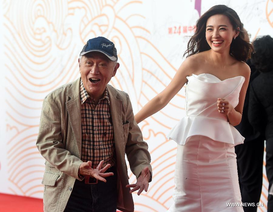 Stars shine at red carpet of 24th China Golden Rooster and Hundred Flowers Film Festival