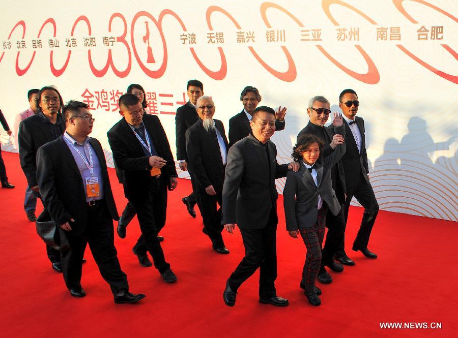 Stars shine at red carpet of 24th China Golden Rooster and Hundred Flowers Film Festival