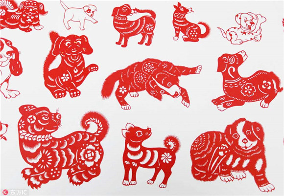 Folk artist creates long scroll of dog-themed paper-cuts