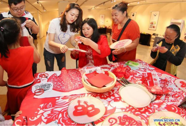 Intangible cultural heritage exhibition held in Yantai