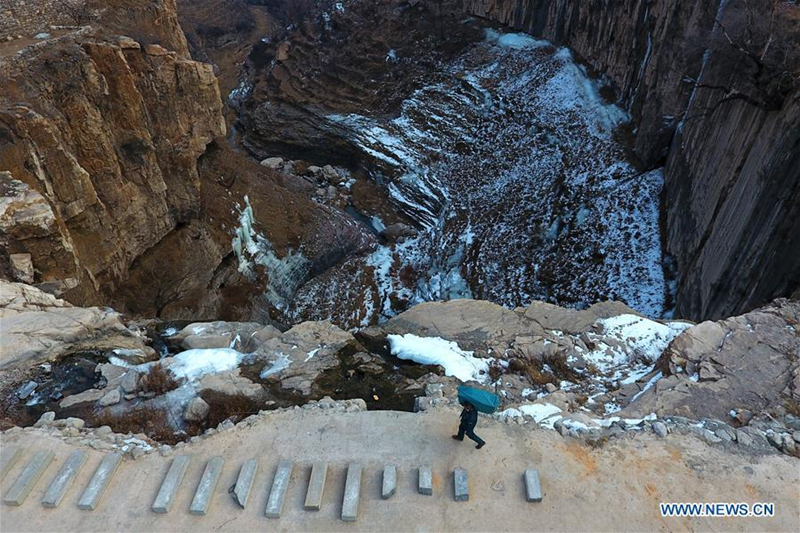 60-year-old postman working in mountainous area for 30 years