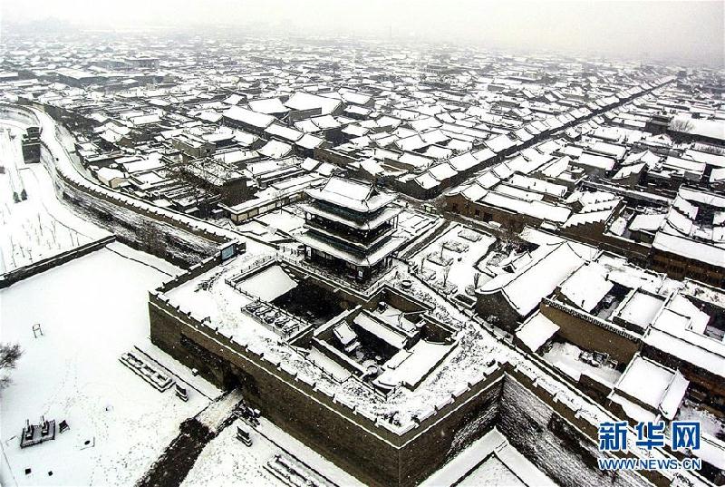 Unique winter scenery brings tourists to Pingyao