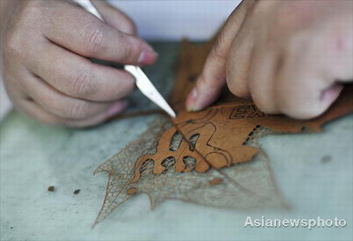 Artist sculptures on leaves