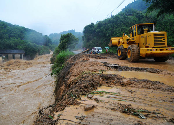 24 missing after landslides engulf vehicles