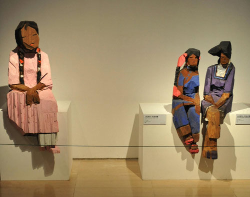 Wooden people exhibit showcases in Beijing