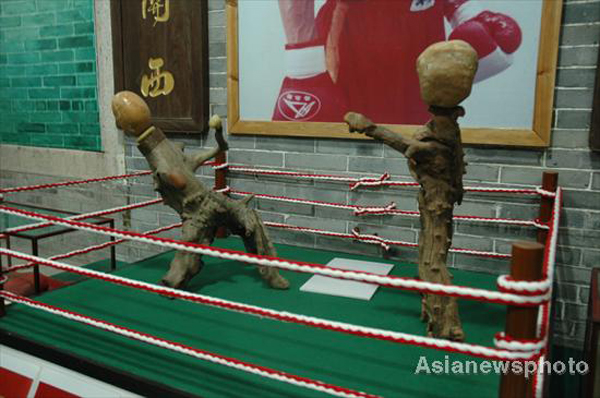 Sports sculptures shown through roots, rocks