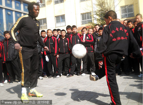 Teaching monks the art of football