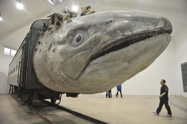 Fish-headed train steams into art gallery