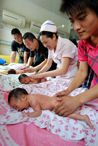 New fathers learn the ropes of the nursery