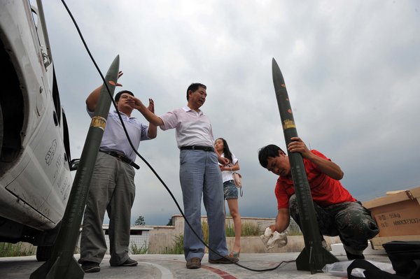 Artificial rain eases drought in SW China