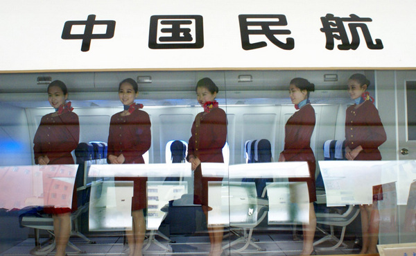 Stewardess applicants prepare for job interviews