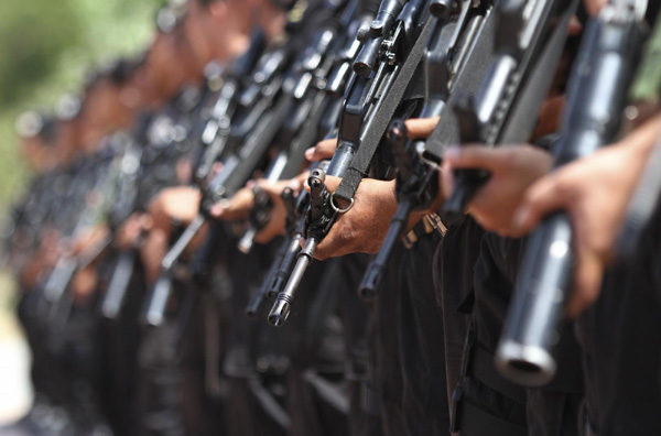 Policemen train for the upcoming ASEAN Summit