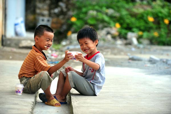 Left behind, children turn to nature