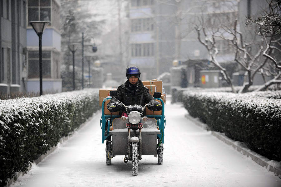 Cold snap brings snow to most parts of China