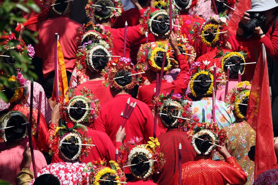 Flamboyant villagers honor sea goddess