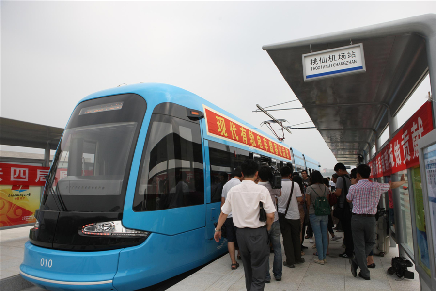 China's 1st modern tram network begins trial run