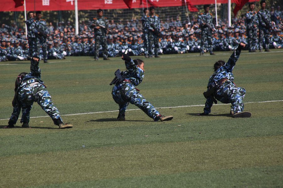 Female freshmen are unique sight in military show