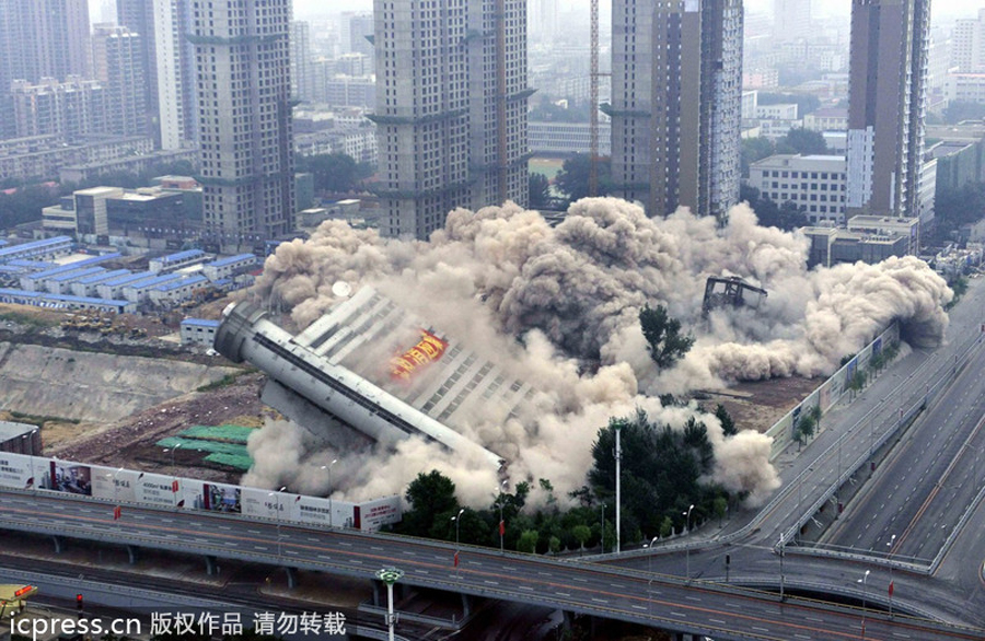 Thermometer-alike building demolished in NE China