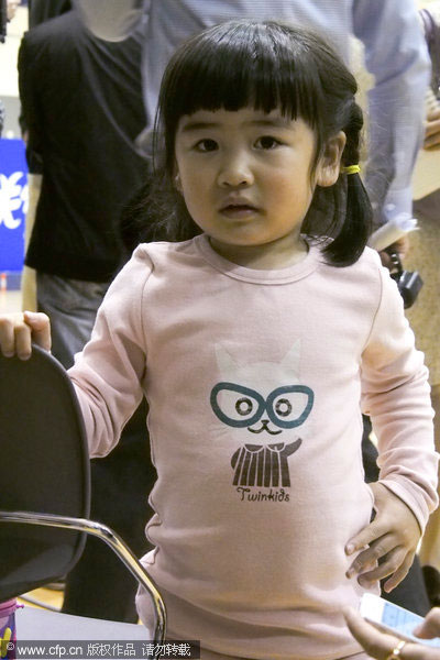 Yao with his daughter at the NBA Cares