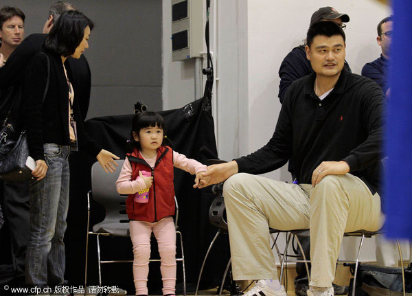 Yao with his daughter at the NBA Cares