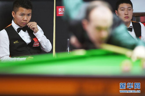 Ding narrowly escapes 1st group match