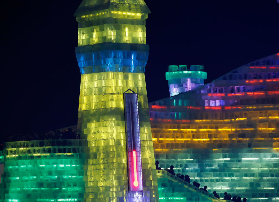 Ice sculptures shine at night in Harbin