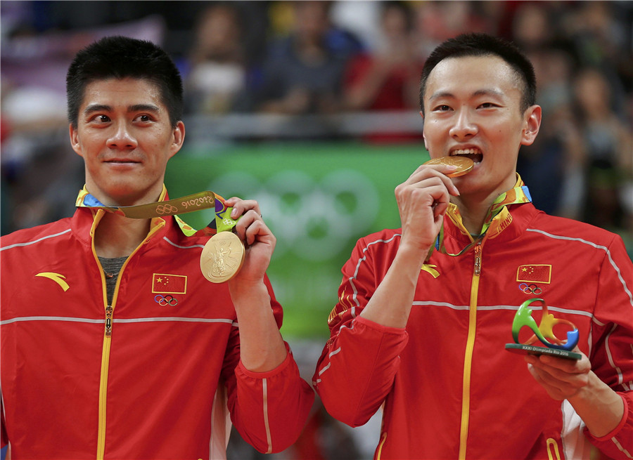 China defeats Malaysia for men's doubles gold in badminton