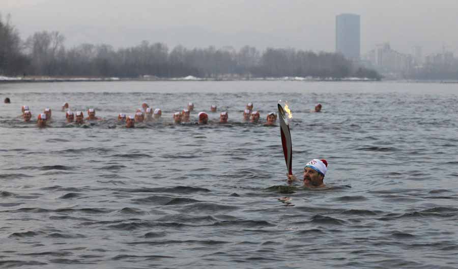 Sochi torch goes for a swim