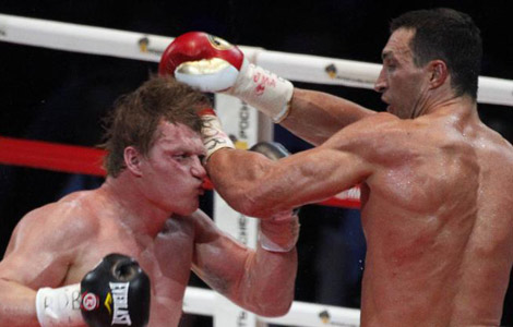 Klitschko retains world titles with points win