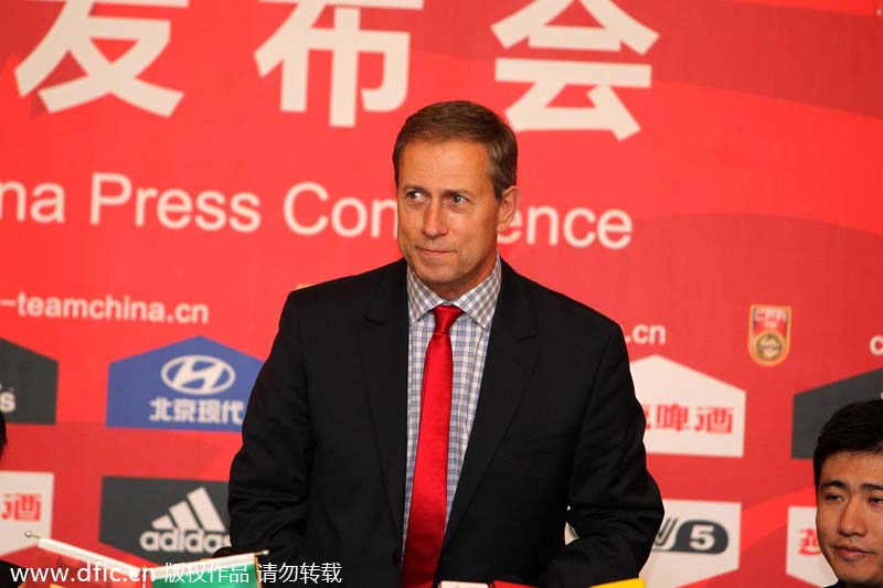 In photos: Frenchman Perrin named coach of Chinese soccer team