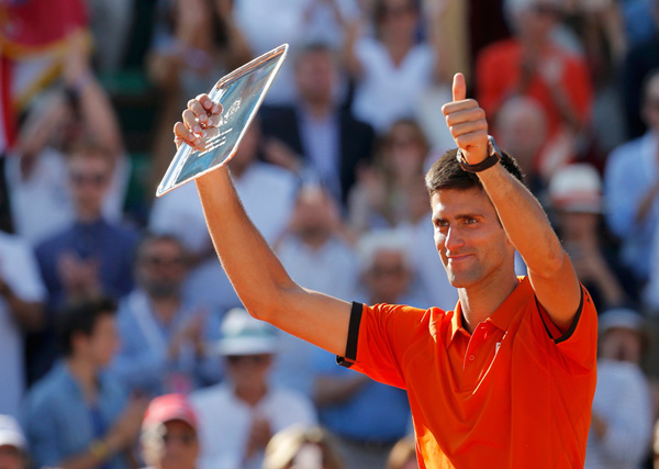 Inspired Wawrinka tames Djokovic to win French Open