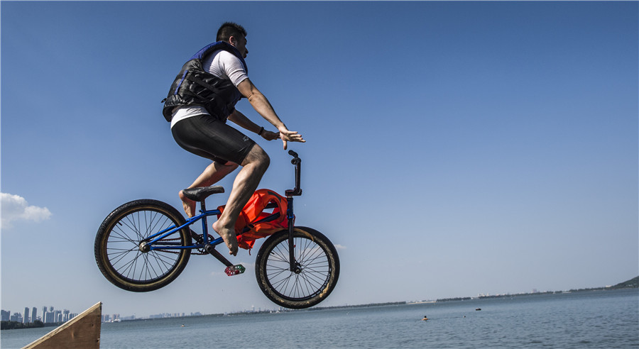 Perfect shot in Wuhan: BMX riders in the air