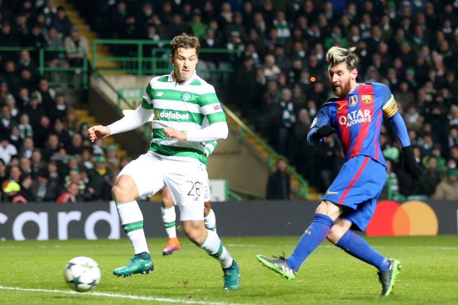 Messi double guides Barcelona to 2-0 win at Celtic