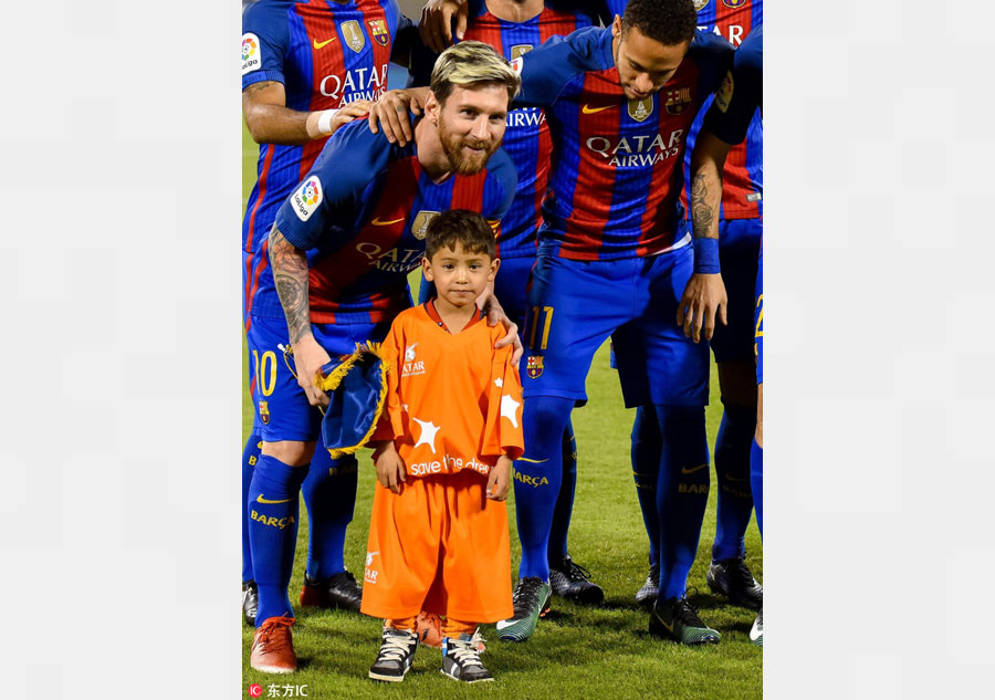 Messi meets Afghan boy famed for plastic bag shirt