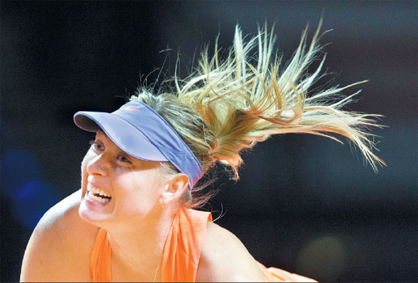 Sharapova lights it up in return