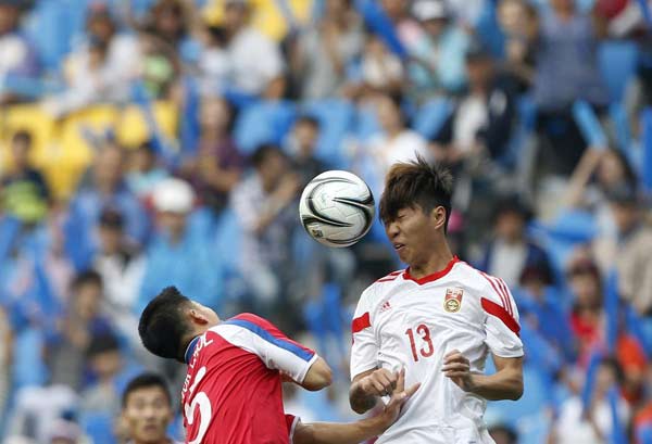 China loses Asian Games soccer opener 3-0