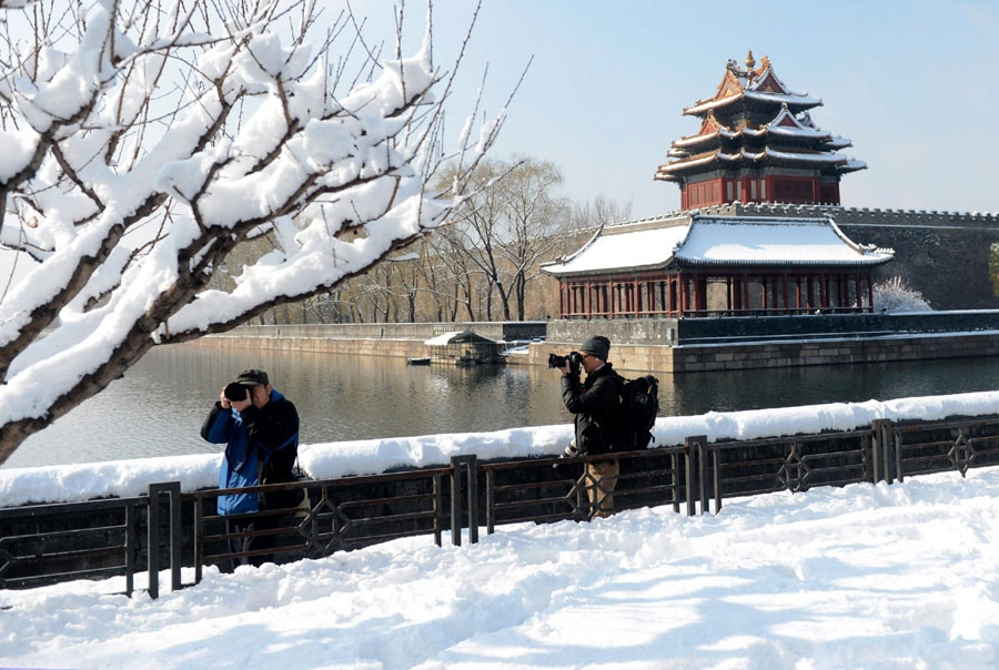 Popular attractions draped in snow